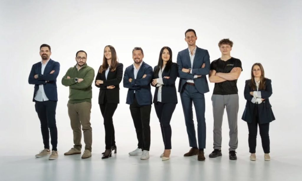 GuestLee luxury property rental team stands together in business attire, ready to assist in Geneva, Zermatt, Montreux & Verbier. | GuestLee luxury rental Switzerland